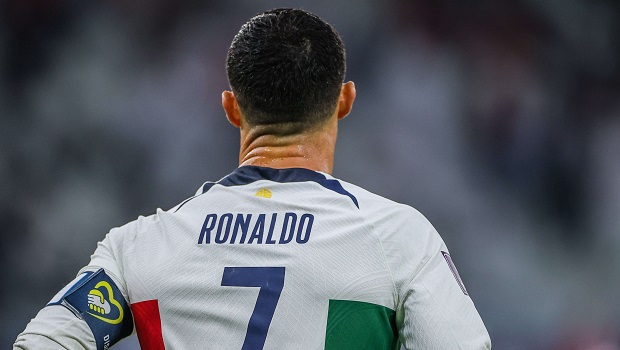Download Cristiano Ronaldo, the Portuguese footballer, strikes a triumphant  pose. | Wallpapers.com