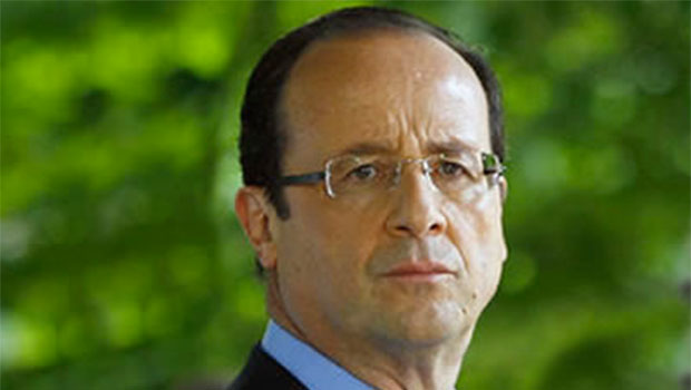 Illustration - François Hollande apostrophé par des Femen / Crédit SIPA