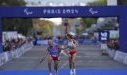 Une marathonienne rate la médaille de bronze pour avoir aidé son guide